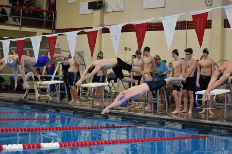 Team leaders and member turnout gear boys’ swim team toward successful season