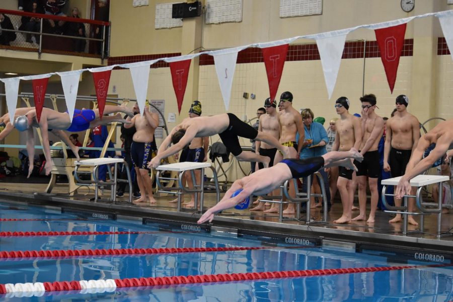 LAUNCH+-+At+the+start+of+the+boys%E2%80%99+400+free+relay%2C+senior+Josh+Zelinsky%2C+middle%2C+dives+into+the+pool.+The+relay+team+of+Zelinsky%2C+juniors+Zach+Turnitza+and+Jordan+Young+and+freshman+Zaidian+Vanorden+set+the+record+with+a+time+of+3%3A28.8+at+the+Schuylkill+Sprint+meet+held+January+6+at+the+Ned+Hampford+Natatorium.+%E2%80%9CWe+are+using+setting+the+record+to+drive+us+to+win+districts.+We+all+have+been+working+very+hard+to+get+this%2C%E2%80%9D+Zelinsky+said.+%E2%80%9CThese+accomplishments+aren%E2%80%99t+just+for+us+-+they%E2%80%99re+for+Coach+Ned+Hampford+as+well.+He+is+the+real+motivation+for+our+success.%E2%80%9D%0A