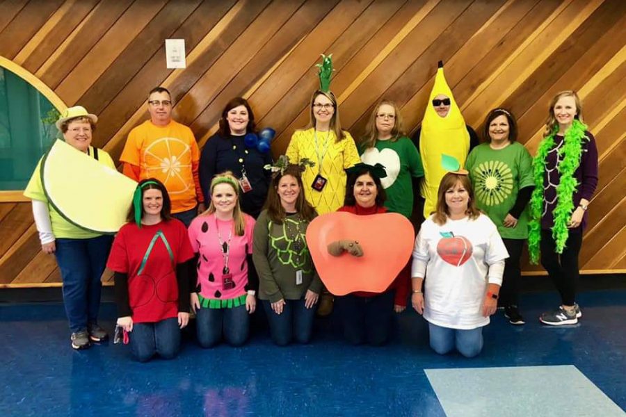 John+S.+Clarke+teachers+dressed+as+a+fruit+salad+pose+for+a+picture.+Teachers+and+students+at+the+elementary+center+held+their+annual+Halloween+parade+on+Friday%2C+October+26.+%E2%80%9CThe+parade+gives+all+the+children+something+to+participate+in+instead+of+doing+math+and+reading.+The+parade+lets+the+community+be+a+part+of+it.+The+parents+get+to+watch%2C%E2%80%9D+Mrs.+Debbie+Lecker+said.%0A