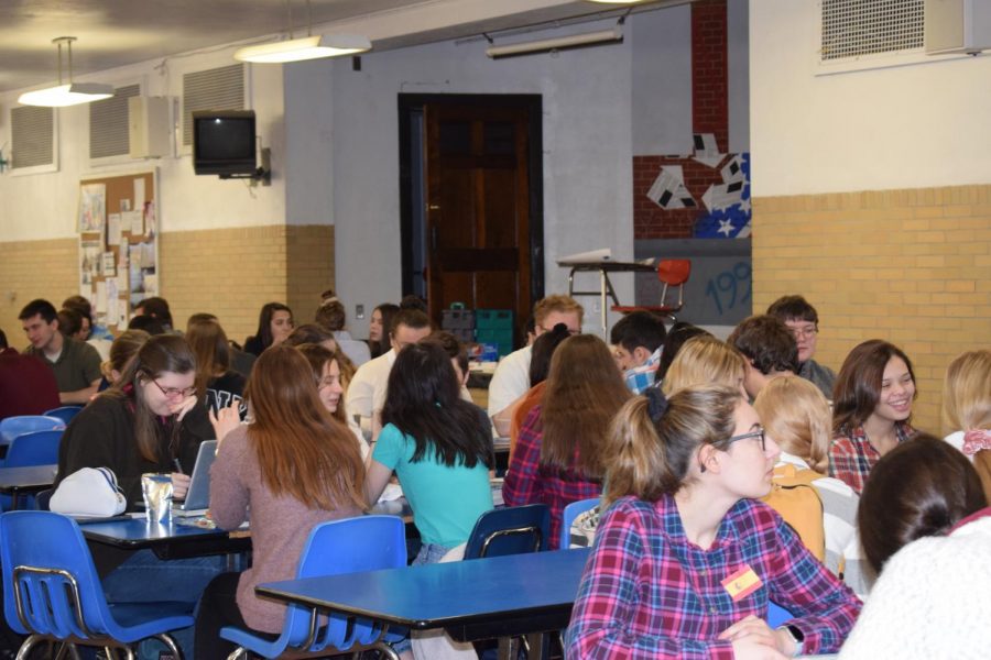 Students+who+excel+in+their+foreign+language+classes+enjoy+a+special+breakfast.+Later+that+day%2C+they+were+inducted+into+their+respective+Foreign+Language+National+Honors+Societies.+Sophomore+Emma+Smith+said%2C+%22+It+was+fun+to+sit+next+to+all+my+friends+and+chat+for+a+bit+while+we+ate+donuts+and+drank+capri+suns.%22