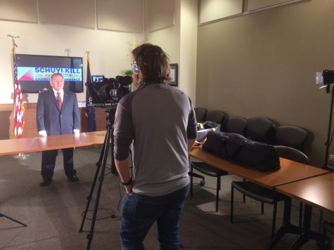 PAHS Publications member Alex Albertini operates a video camera for a shoot at the Schuylkill Chamber of Commerce.