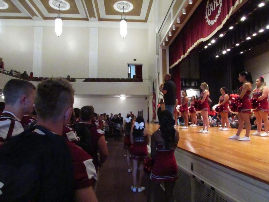 PAHS+cheerleaders+perform+at+the+first+pep+rally.+Some+of+the+cheers+they+showed+were+%E2%80%9CGive+a+Yell%E2%80%9D+and+%E2%80%9CGo+Big+Red.%E2%80%9D++Senior+Isabella+Woodford+%5Bin+the+audience%5D+said%2C+%E2%80%9CThe+pep+rallies+before+the+game+are+most+memorable+and+one+of+the+best+parts+of+the+week.%E2%80%9D+