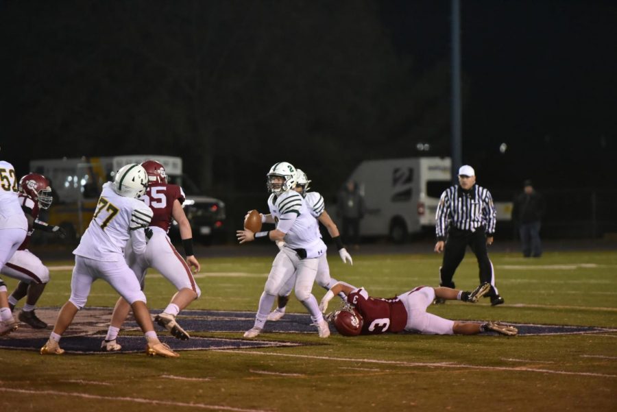 Junior+Robert+Walchak+dives+in+an+attempt+to+tackle+the+ACC+quarterback.+Walchak+played+football+since+he+was+young+and+has+dreamed+about+winning+the+District+Championship.+%E2%80%9CWe+deserved+that+win+so+much+more+than+any+other+team+in+the+district%2C%E2%80%9D+said+Walchak.