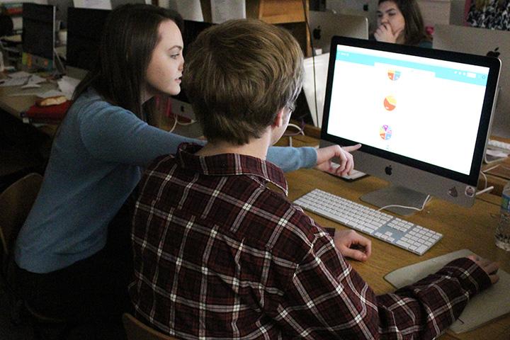 Seniors+Collin+Starr+and+Jess+Angelichio+observe+their+survey+results+from+the+statistics+project.+The+project+has+been+apart+of+the+AP+Statistics+curriculum+for+five+years.+%22Collin+and+I+polled+the+student+body+at+random+to+see+what+their+favorite+meme+from+2016+was.+They+got+to+choose+from+different+memes+such+as+Harambe+and+Joe+Biden.+The+project+helped+with+our+understanding+of+sampling+a+large+population%2C+which+we+were+learning+about+at+the+time.+Our+final+results+showed+that+Harambe+was+the+favorite+among+students+at+PAHS%2C%22+Angelichio+said.