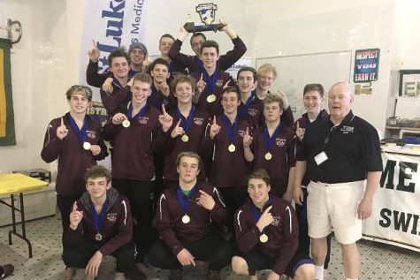 The end of a record-breaking season: boys’ swim team excels in late-season meets