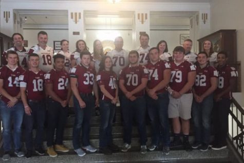 Senior football players and their inspirational teachers