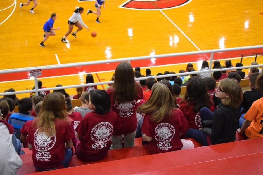 Middle+schoolers+from+D.H.H.Lengel+and+Saint+Clair+sit+in+the+bleachers+watching+their+peers+play+basketball.+They+enjoyed+playing+basketball%2C+watching+basketball%2C+and+swimming.++%E2%80%9CI%E2%80%99m+having+a+good+time+watching+the+game+with+my+friends%2C%22+eighth+grader+Alejandro+Serano+said.