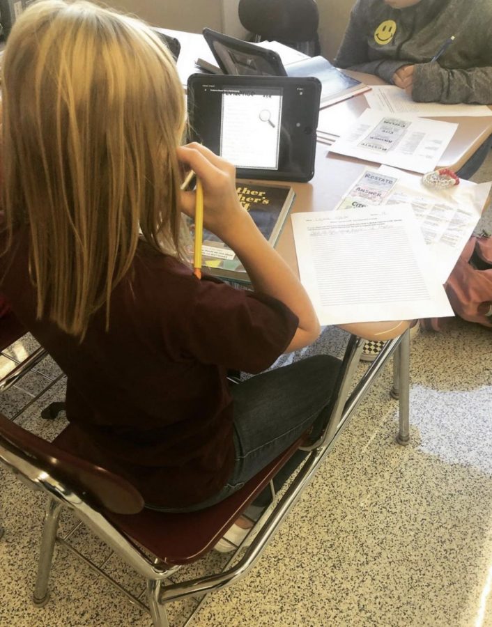 WRITE+-+Sixth+grader+Lexie+Scanlan+uses+her+iPad+to+assist+in+completing+a+text-dependent+analysis+assignment+in+ELA+class.